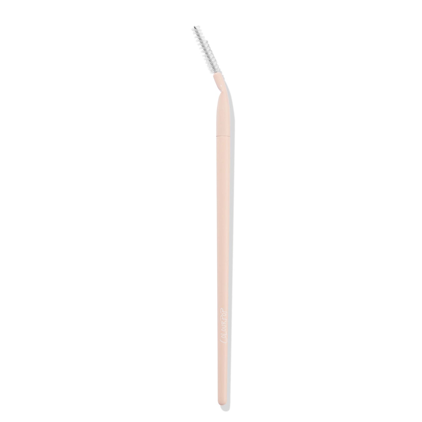 ColourPop Brow Brush makeup brush shaping brows with an angled spoolie head, featuring a blush‑pink handle and white spiral bristles; studio product shot on a clean white background.