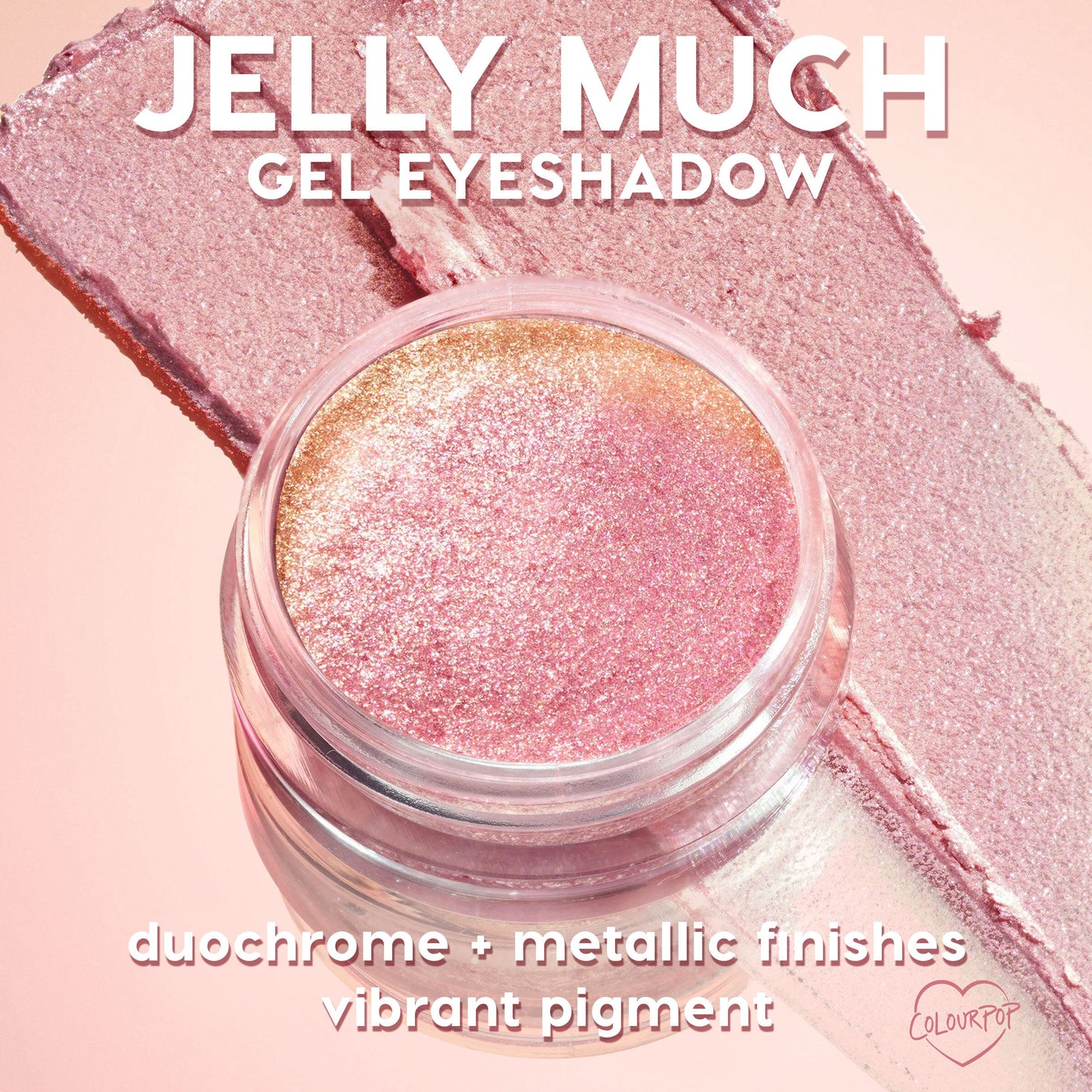 ColourPop Jelly Much Shadow Boo-Kay sparkles in an open glass jar, a pink-to-gold duochrome gel eyeshadow with metallic shimmer, shown swatched in smooth wide strokes on a soft pink background.