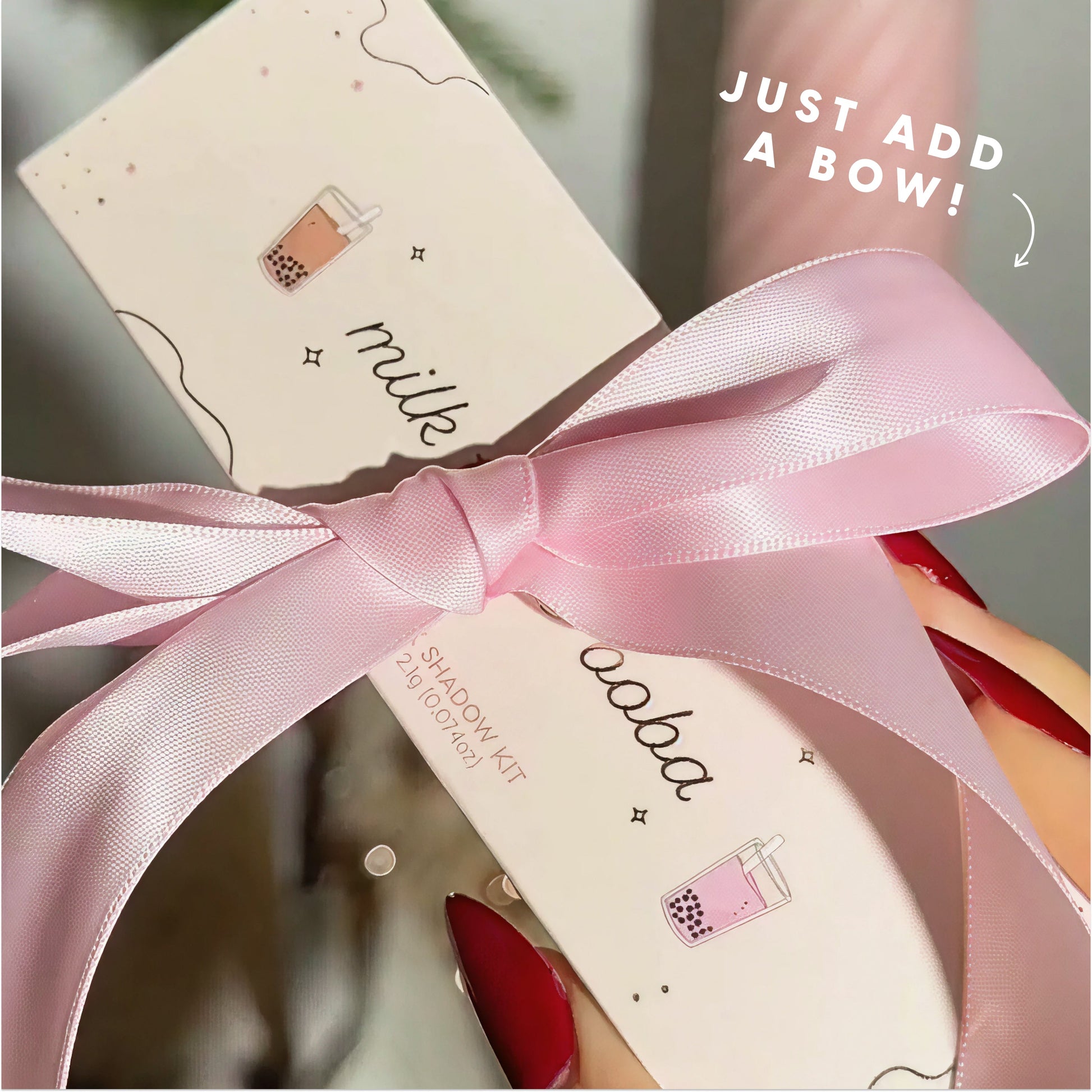 Sweet Sips full collection set Super Shock Shadow boxes decorated with cute bubble tea illustrations, tied together with a glossy pink ribbon bow against a soft pastel background, ready for gifting.
